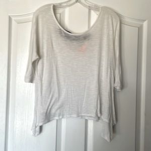 Sheer white top with black detail at back